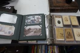 Two albums of postcards and antique portrait pictures