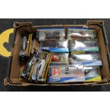 A crate of die cast vehicles,