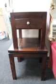 A hardwood lamp table fitted a drawer together with a further occasional table