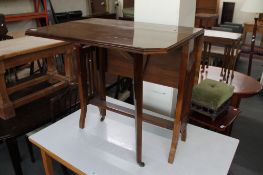 An Edwardian mahogany Sutherland table