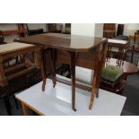 An Edwardian mahogany Sutherland table