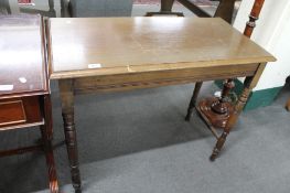 An Edwardian mahogany side table