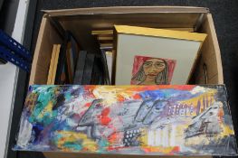 A box of pictures and prints,