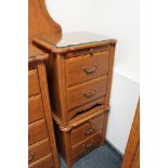 A pair of contemporary two drawer bedside cabinets