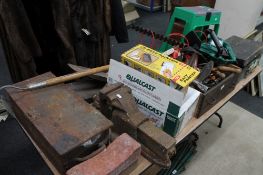 A large quantity of garden tools, large metal vice,