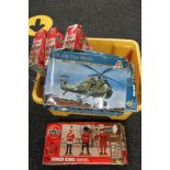 A box of Airfix kits,