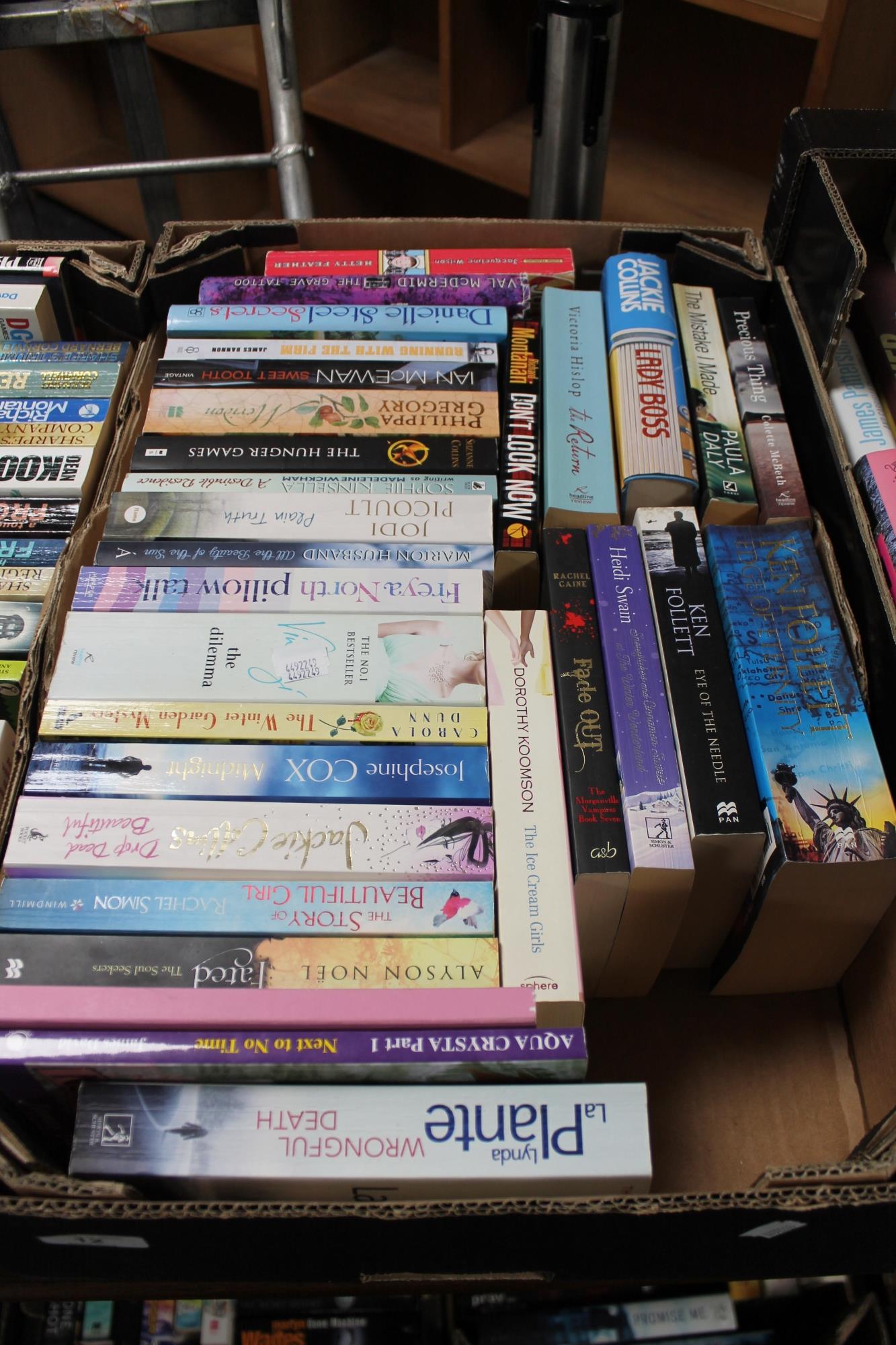 A box of paperback books