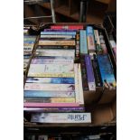 A box of paperback books