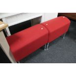 Two contemporary red upholstered stools