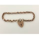 A 9ct rose gold padlock bracelet CONDITION REPORT: 8.