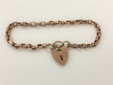 A 9ct rose gold padlock bracelet CONDITION REPORT: 8.