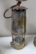 A brass miner's lamp by Eccles