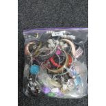 A bag of costume jewellery