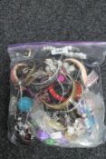 A bag of costume jewellery