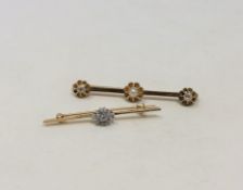 A 9ct gold seed pearl bar brooch set with a ruby coloured stone, 3.6g.