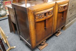 An early 20th century oak sideboard