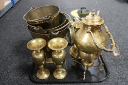 A tray of brass buckets, brass lamp,