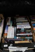 A box of paperback books