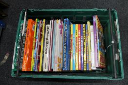 A plastic crate of children's annuals,