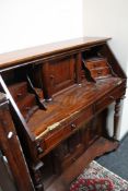 A reproduction mahogany desk