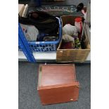 A plastic storage crate of sundries, cds, bags,