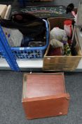 A plastic storage crate of sundries, cds, bags,