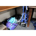 A folding wheelchair and a Dyson vacuum
