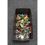 A box of plastic toy figures,