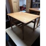 A teak low table and a further occasional table