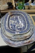 Four antique blue and white china meat plates