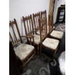 A set of six Ercol oak dining chairs