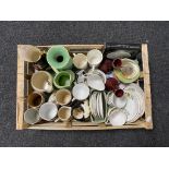 A crate and box of assorted china, commemorative mugs, tea china, Ringtons jug,