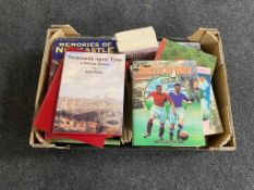 A box of books, children's annuals, paperback novels,