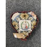 A heart shaped sweetheart pin cushion,