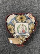 A heart shaped sweetheart pin cushion,