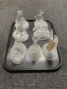 A tray of seven crystal animal ornaments on stands, polar bear, seal with pup,