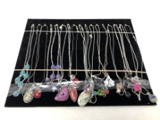 A collection of seventeen vintage style Sterling silver necklace and pendants