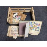 A box of assorted stamp albums and stamps,