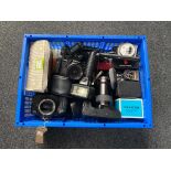 A crate of a quantity of assorted cameras and accessories