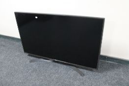 An LG 49" LCD TV with remote