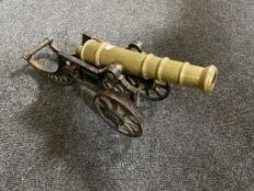 A brass signal cannon