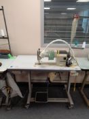 A Korean KM-235A industrial electric flat sewing machine in table