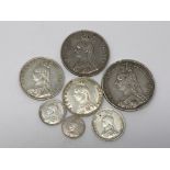 An 1887 Crown together with six other silver coins (7)