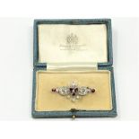 A superb quality ruby diamond and platinum brooch CONDITION REPORT: The box looks to