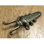 A Victorian brass 'Beatle' boot pull by Edmund Ashworth, Bradford.