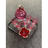 A cranberry glass lidded bowl, 1970's red glass ash tray,