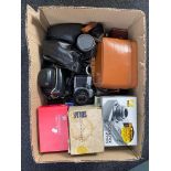 A box of a quantity of assorted cameras