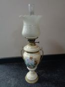 A 19th century ceramic and glass oil lamp