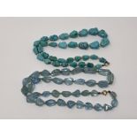 An antique turquoise and pearl necklace with gold clasp,