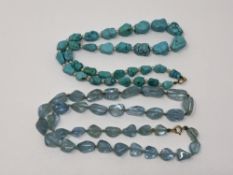 An antique turquoise and pearl necklace with gold clasp,